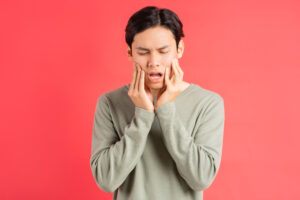 man with sensitive teeth