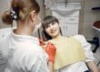 Photo by Gustavo Fring: https://www.pexels.com/photo/a-woman-on-a-dental-check-up-4971511/ - woman preparing for dental surgery